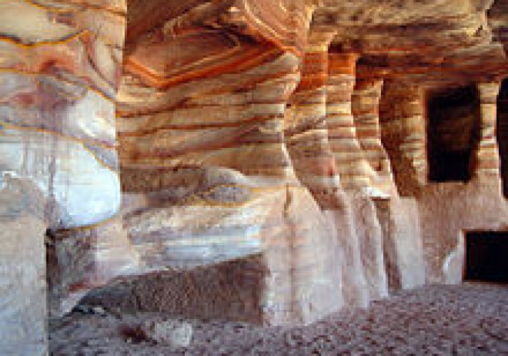 Rock formations that are primarily composed of sandstone usually allow percolation of water and other fluids.
